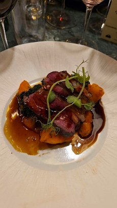 Lamb rump with patatas riojana served at a wine dinner in Winchester